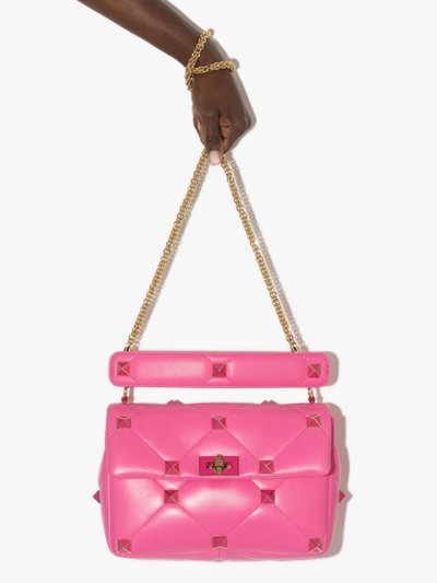 Shop Valentino Roman Stud Shoulder Bag In Pink