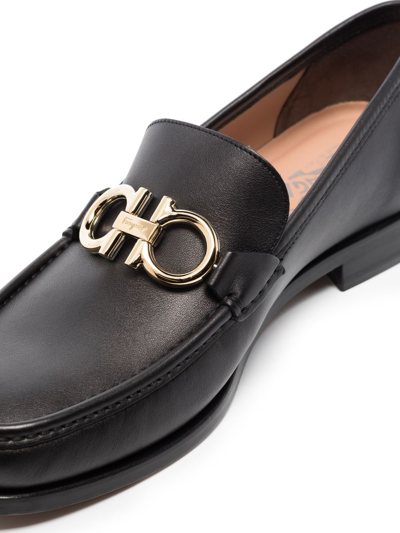 Shop Ferragamo Gancini Buckle Leather Loafers In Black