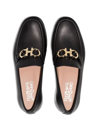 Shop Ferragamo Gancini Buckle Leather Loafers In Black