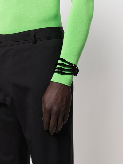 Shop Raf Simons Skeleton Hand Cuff Bracelet In Schwarz