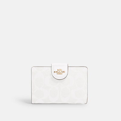 Shop Coach Outlet Medium Corner Zip Wallet In Signature Canvas In White
