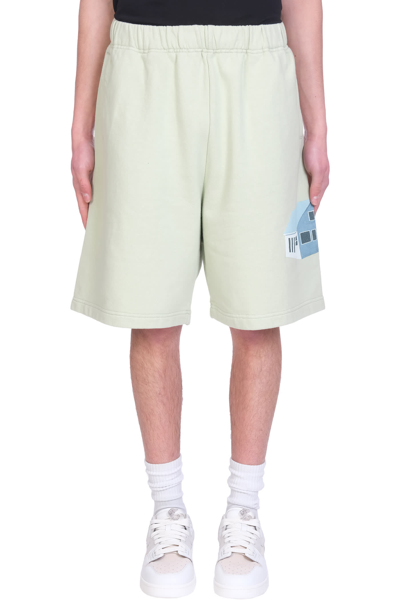 Shop Undercover Shorts In Green Cotton