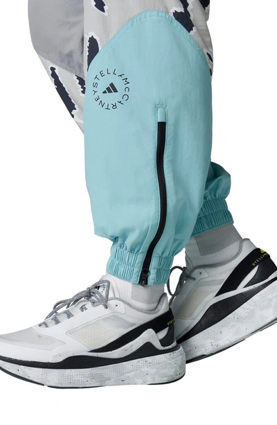 Shop Adidas By Stella Mccartney Colorblock Recycled Nylon Track Pants In Ltonix/ Splash