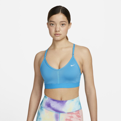 Shop Nike Women's Indy Light-support Padded V-neck Sports Bra In Blue