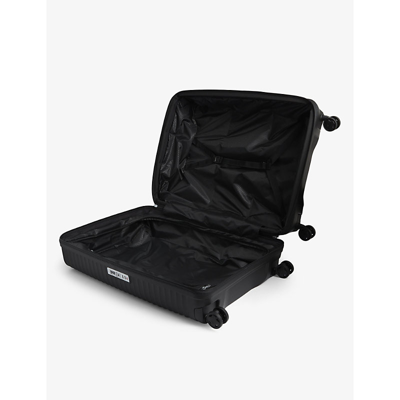 Shop Samsonite Black Upscape Spinner Four-wheel Shell Suitcase