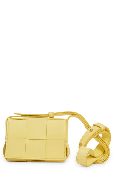 Shop Bottega Veneta Mini Cassette Intrecciato Leather Crossbody Bag In Lantern-gold