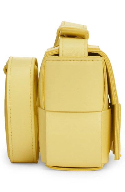 Shop Bottega Veneta Mini Cassette Intrecciato Leather Crossbody Bag In Lantern-gold