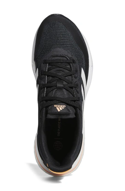 Adidas Originals Supernova Running Shoe In Black/ White/orange