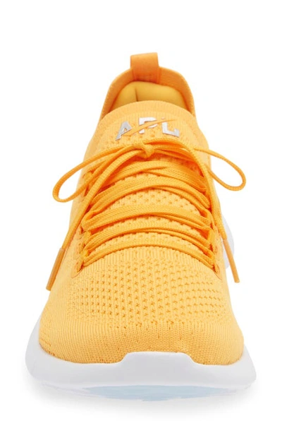Apl Athletic Propulsion Labs Techloom Breeze Knit Running Shoe In Mango / Silver / White