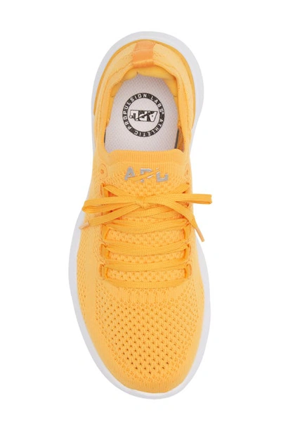 Apl Athletic Propulsion Labs Techloom Breeze Knit Running Shoe In Mango / Silver / White