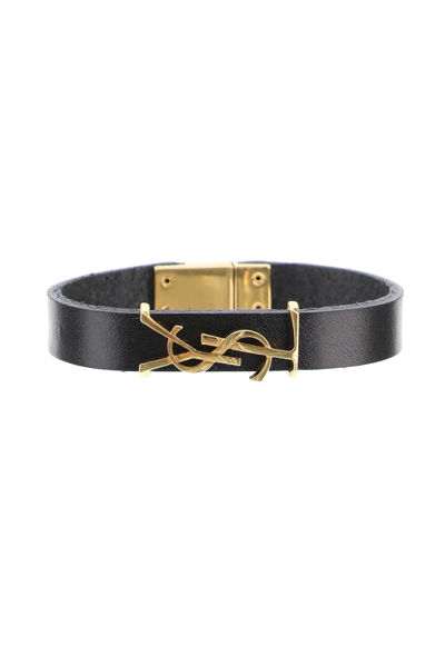 Shop Saint Laurent Leather Ysl Bracelet In Black