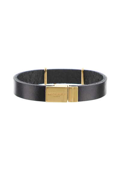 Shop Saint Laurent Leather Ysl Bracelet In Black