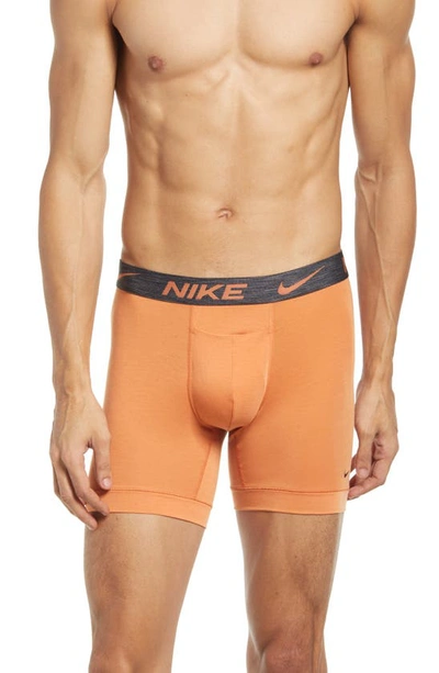 Shop Nike Dri-fit Assorted 2-pack Reluxe Boxer Briefs In Hot Curry/ Thunder Blue