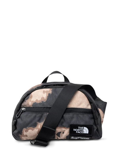 Shop Supreme X The North Face Roo Ii Bleached Denim-print Bag In Brown