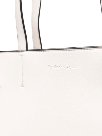 Shop Calvin Klein Jeans Est.1978 Debossed-monogram Tote Bag In Neutrals