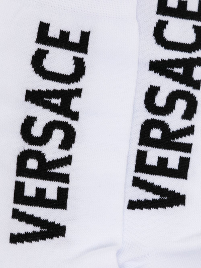 Shop Versace Logo-lettering Ankle Socks In White