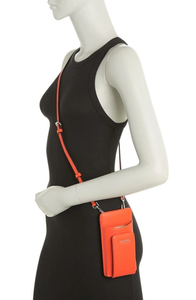 Shop Calvin Klein Saffiano Phone Crossbody Bag In Fiery Oran