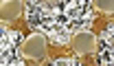 Suzy Levian Gold Plated Sterling Silver White Cz Flower Pave Eternity Band In Yellow