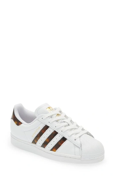 Shop Adidas Originals Superstar Sneaker In White/ White/ Gold Met.