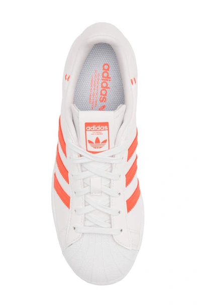 Shop Adidas Originals Superstar Sneaker In Crystal White/ Solar Red/ Grey