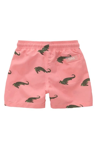 Shop Oas Kids' Coral Crocodile Swim Trunks In Pink