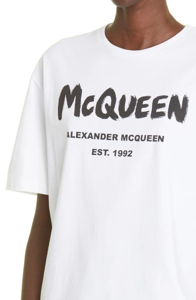 Shop Alexander Mcqueen Gender Inclusive Graffiti Glitter Logo Cotton Graphic T-shirt In White/black