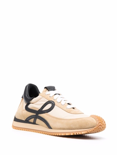 Shop Loewe Flow Run Sneakers In Gold