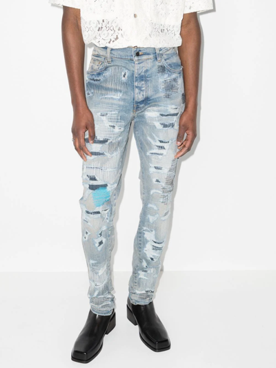 Shop Amiri Distressed-finish Skinny Jeans In Blue