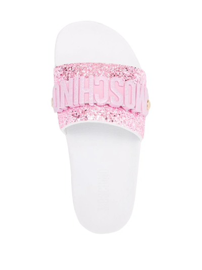 Shop Moschino Embossed-logo Open-toe Slides In Pink