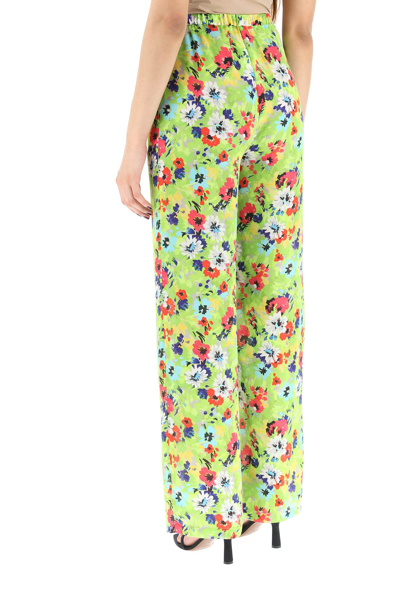 Shop Msgm Floral Print Trousers In Green,blue,red