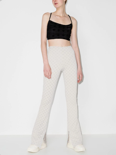 Shop Misbhv Monogram Print Reflective Flared Trousers In Grey