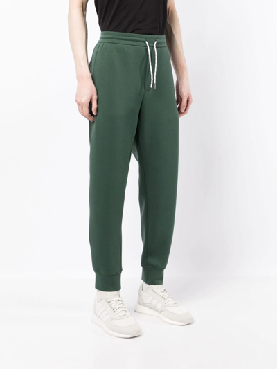 Shop Emporio Armani Embroidered Logo Tapered Track Trousers In Grün