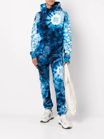 Shop Amiri Tie-dye Logo-print Cotton Hoodie In Blau