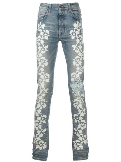 Shop Amiri Floral-print Skinny Jeans In Blau