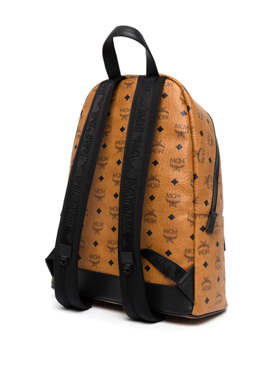 Shop Mcm Medium Stark Monogram-print Backpack In Brown