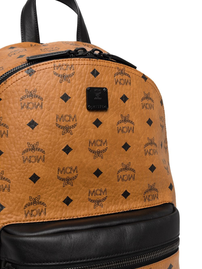Shop Mcm Medium Stark Monogram-print Backpack In Brown