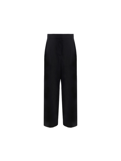 Shop Ferragamo Pants In Black
