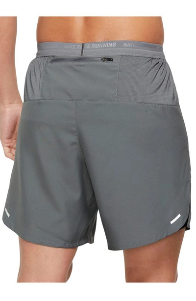 Shop Nike Dri-fit Stride 2-in-1 Running Shorts In Smoke Grey/ Silver