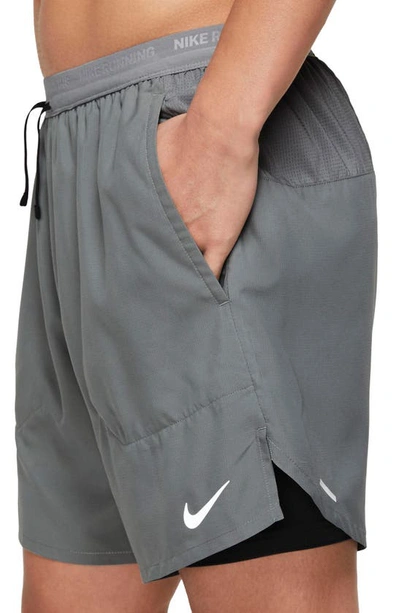 Shop Nike Dri-fit Stride 2-in-1 Running Shorts In Smoke Grey/ Silver