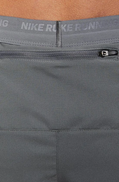 Nike Dri-fit Stride 2-in-1 Running Shorts In Smoke Grey/ Silver