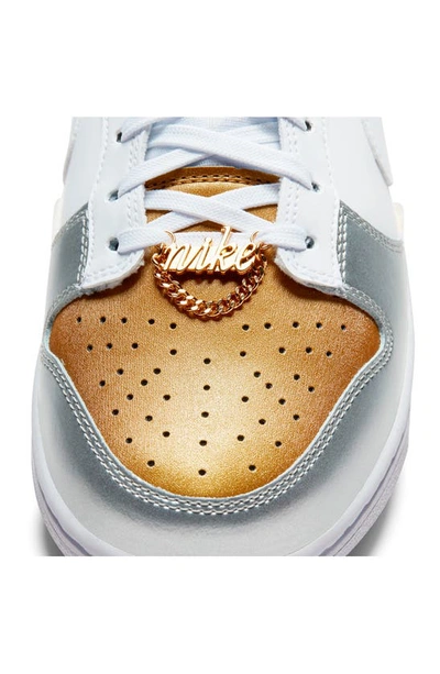 Shop Nike Dunk Low Basketball Sneaker In Gold/ White/ Silver/ Red