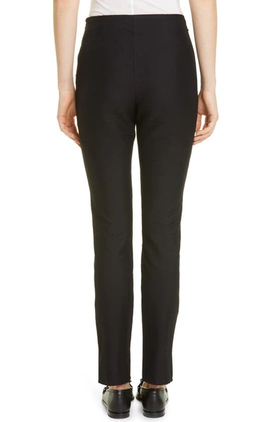 Shop Totême Slit Cuff Skinny Fit Linen Blend Pants In Black