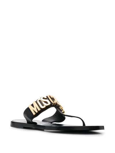 Shop Moschino Logo-plaque Flat Sandals In Black