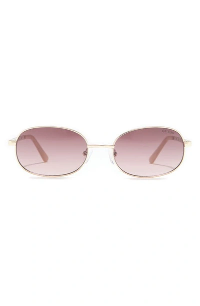 Shop Guess 55mm Oval Sunglasses In Gold / Gradient Brown