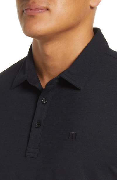 Travismathew The Heater Solid Short Sleeve Performance Polo In Black