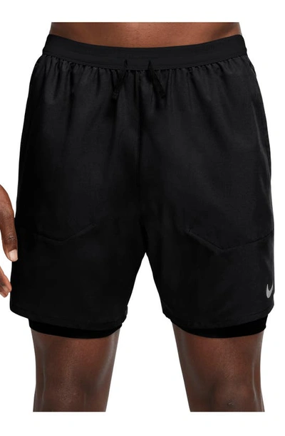 Shop Nike Dri-fit Stride 2-in-1 Running Shorts In Black/ Black/ Silver