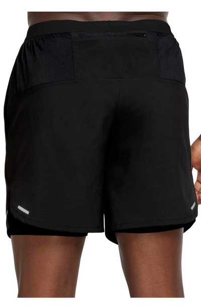 Shop Nike Dri-fit Stride 2-in-1 Running Shorts In Black/ Black/ Silver