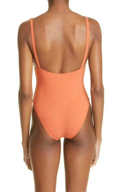 Shop Totême Deep V-neck One-piece Swimsuit In Burnt Orange