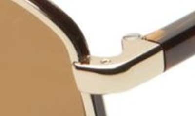 Shop Prada 57mm Polarized Square Sunglasses In Pale Gold