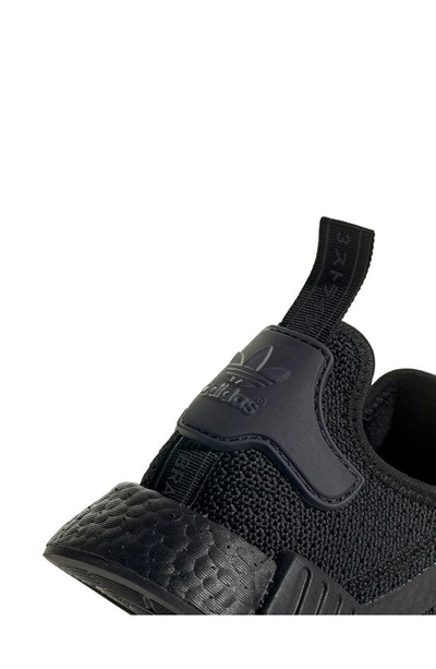 Shop Adidas Originals Nmd R1 Sneaker In Core Black/white